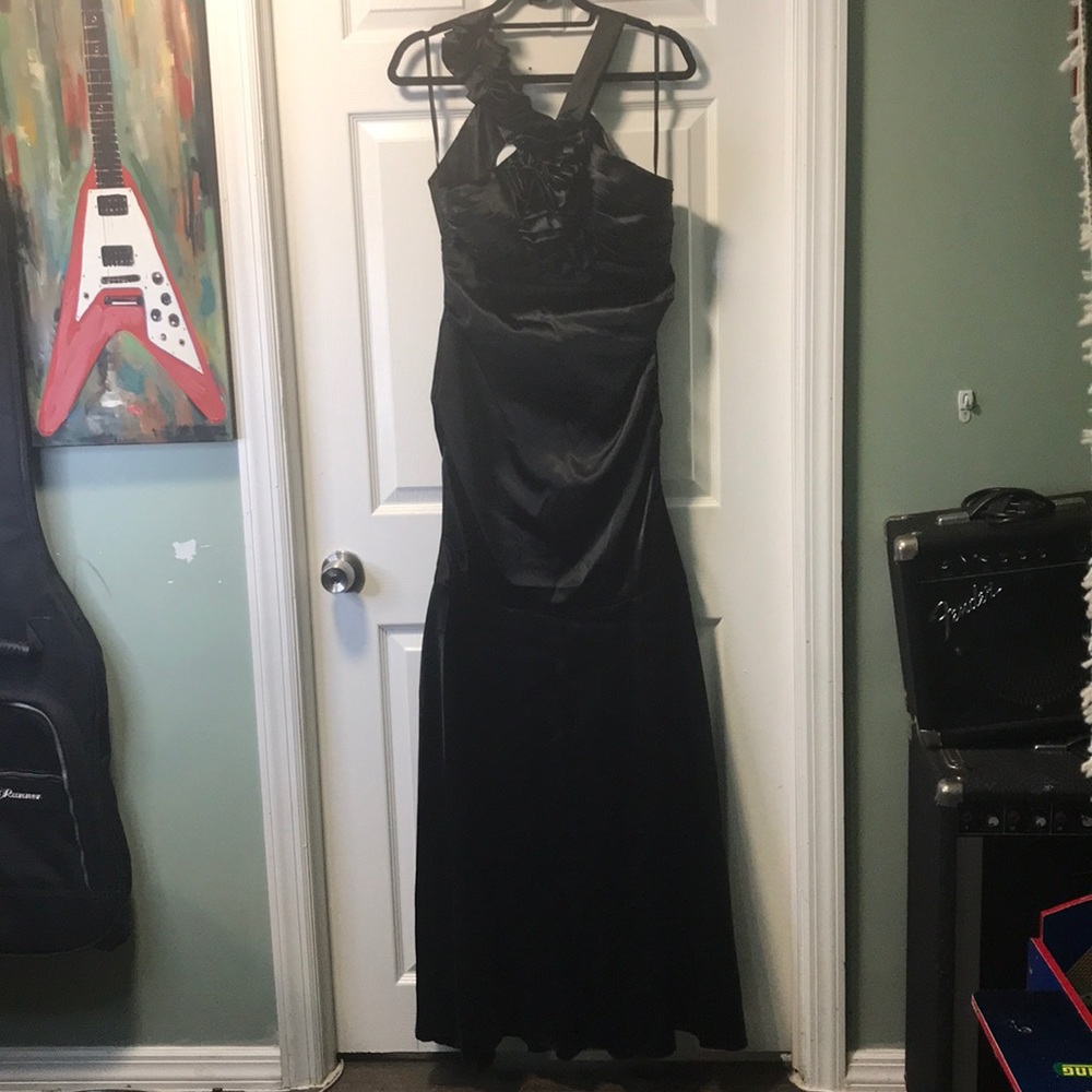 Woman’s long Semi backless black dress